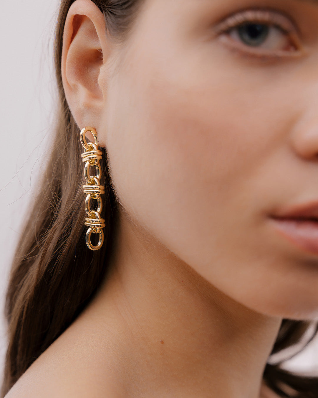 Aretes Eslabones Cruzados